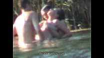 Threesome fucking in water